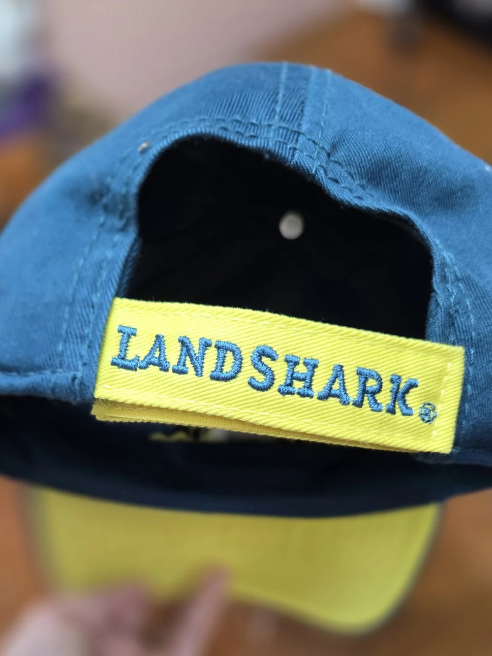 Embroidered Blue Baseball Cap with Yellow Shark Fin Motif